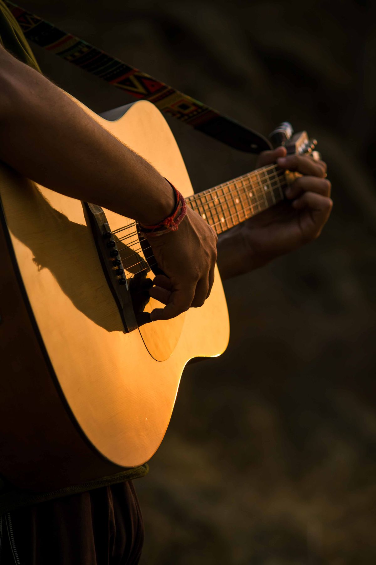 Hands on a guitar neck